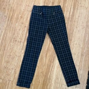 Black and white dress pants with stylish zippers